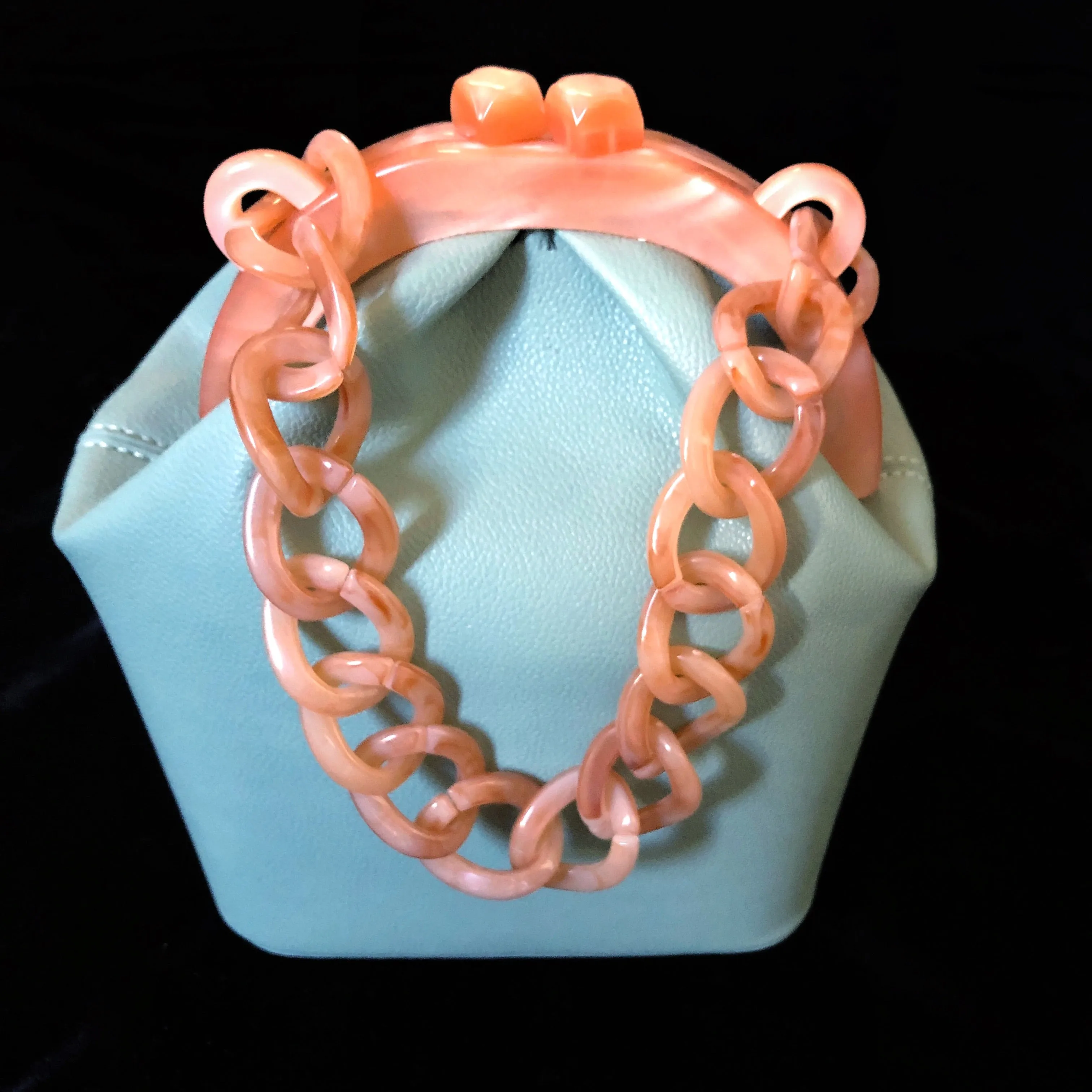 A DUCK EGG VINYL AND LUCITE BAG