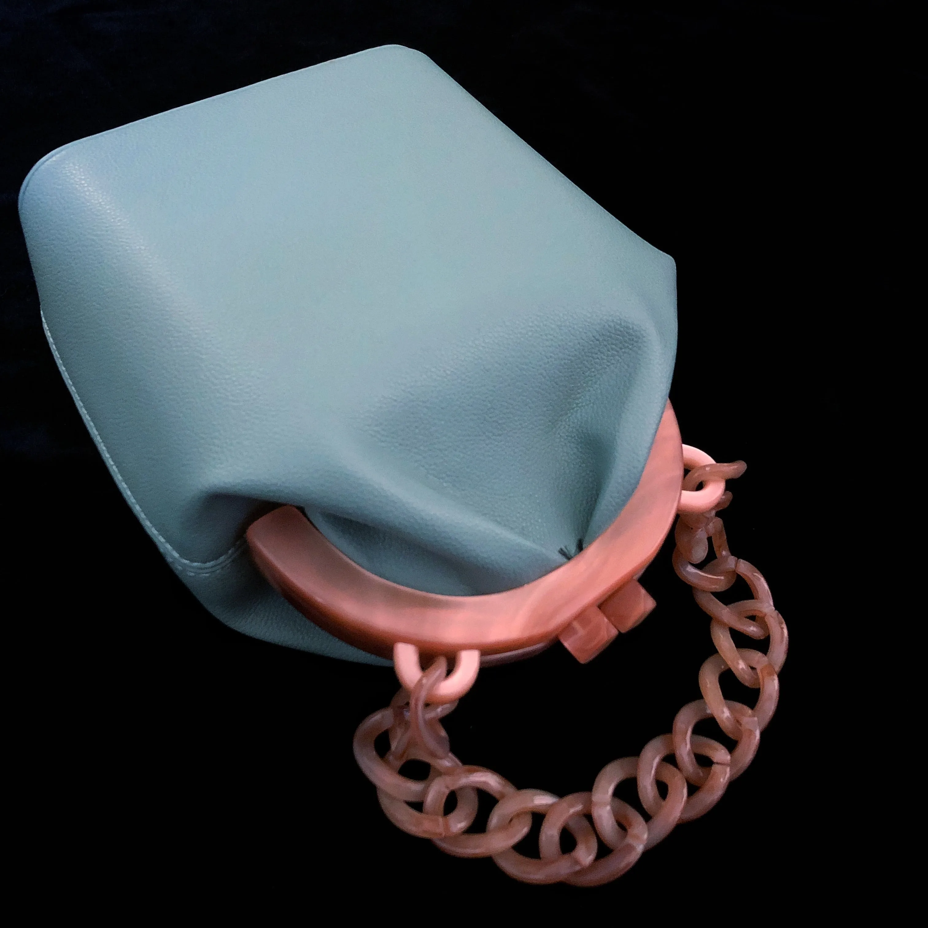 A DUCK EGG VINYL AND LUCITE BAG