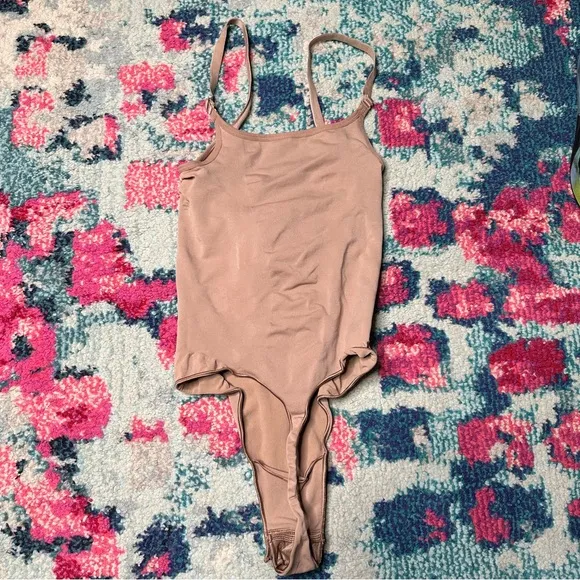 Skims Seamless Sculpt Open Bust Thong Bodysuit in Sienna