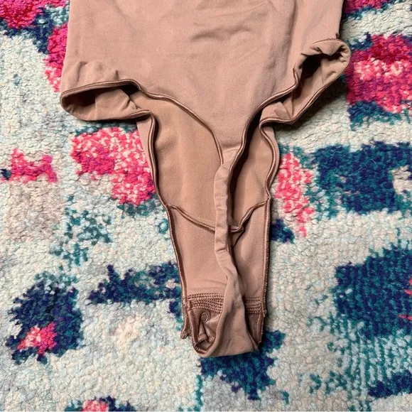 Skims Seamless Sculpt Open Bust Thong Bodysuit in Sienna